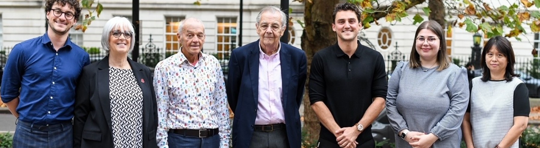 The London Tax Bureau team standing together outside a Georgian building in London
